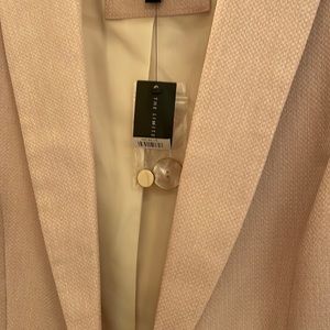 Brand new limited blazer. X small. Never worn.